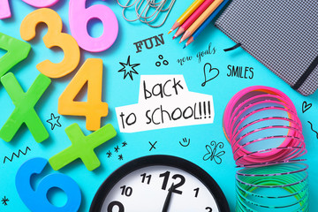 stationery, clock and text back to school.
