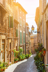 Fototapeta na wymiar Street of Valldemossa old mediterranean village, landmark of Majorca, Spain island