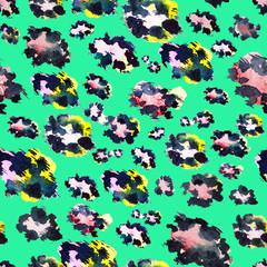 Leopard seamless print on a green background with multi-colored spots. Imitation of exotic animal fur