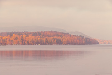 Autumn between villages  nature and water in Scandinavia