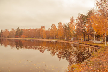 Autumn between villages  nature and water in Scandinavia