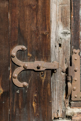 Old door with hinge. Close-Up