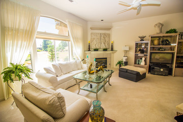 Spacious Modern Great Room with White Couch And Fireplace