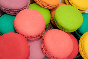 French Colorful Macarons on Pink Background