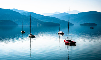 sailboats at the walchensee lake in germany