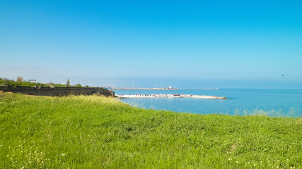 View from cliff on water of Black Sea. Beautiful transparent water of Black Sea, exploration and...