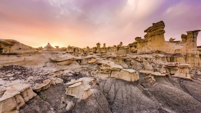 Bisti/De-Na-Zin Wilderness, New Mexico, USA at Valley of Dreams after sunset.