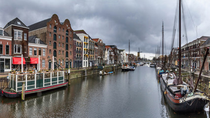 Fototapeta na wymiar Cityscape, panorama - view of the city Rotterdam and its old district Delfshaven, South Holland, The Netherlands.