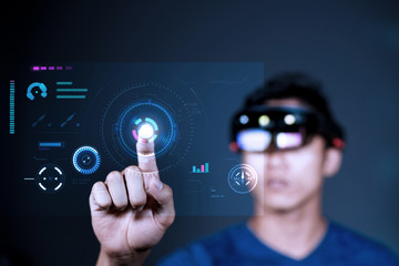 Using VR glass to enter virtual reality world. Future Technology Magic Equipment. Men controls...