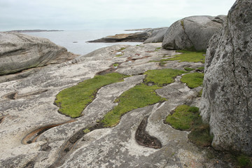 Fototapeta na wymiar Magestic view of The End of the Earth on Tjome in Norway. Verdens Ende (World's End) is composed of various islets and rocks and is a popular recreational area with fantastic panoramic views.