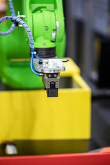 Robotic programmed robot arm. Industrial exhibition of machine tools.