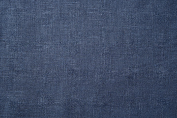 Fototapeta na wymiar Fabric closeup. Dark blue linen texture