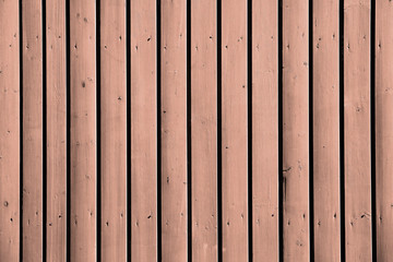Alte Vintage Holzwand oder Holzboden in heller transparenter Farbe und Farbton pastell, orange, grau und braun mit vielen vertikalen Brettern