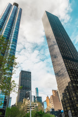 New York City Skyscrapers, Cloudy Sky Background. Architecture, Modern, Vertical Image, Low Angle View