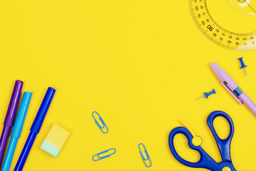 Stationery on yellow background. The concept of the study.