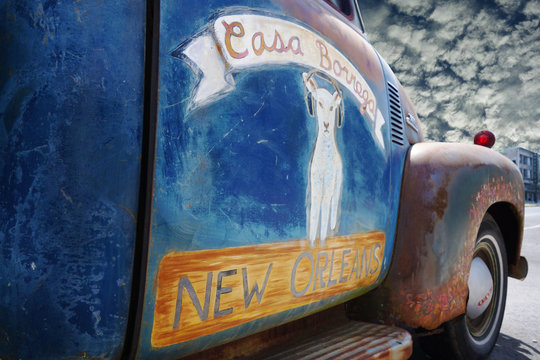 NEW ORLEANS,LA/USA -03-23-2019: An old truck parked in front of the Casa Borrega bar and restaurant in New Orleans