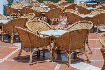 Rattan table and chairs in beach cafe next to the red sea in Sharm el Sheikh, Egypt