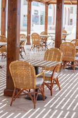 Table and chairs in beach cafe next to the red sea in Sharm el Sheikh, Egypt