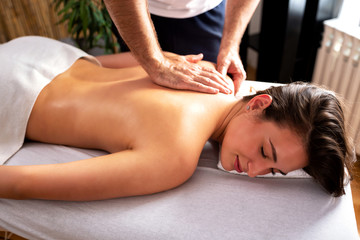 Obraz na płótnie Canvas Upper back area massage in beauty salon