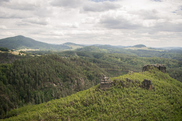 Fototapeta na wymiar forrest cloud day green trees hill enjoy view travel in czech republic during summer holidays sky