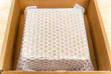 Bubbles covering the box by bubble wrap for protection product