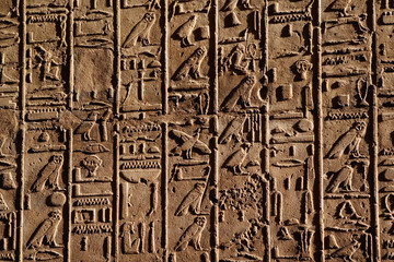 Ancient hieroglyphs on wall at the Temple of Karnak, located at modern day Luxor or ancient Thebes,...