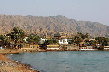 EGYPT, Dahab. Houses of a small city built on the shore of the red sea
