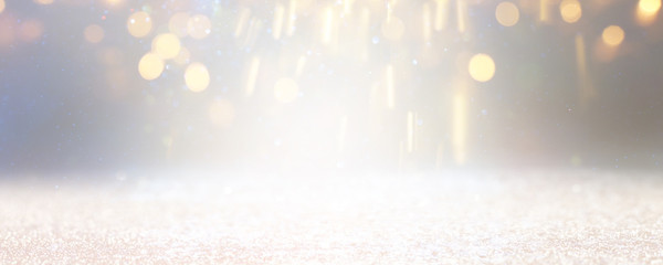 blackground of abstract glitter lights. silver and gold. de-focused. banner