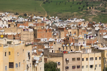 Morocco, Fes. City buildings loaded with satellite dishes.