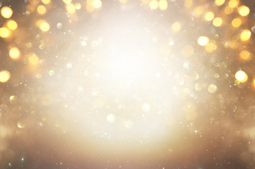 blackground of abstract glitter lights. silver and gold. de-focused