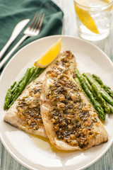 Baked fish fillet in peanut sauce.