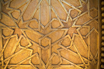 Africa, Morocco, Fes, Fes Medina, brass doors with symbols of sun, moon, stars and tree of life.