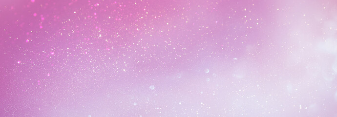 background of abstract glitter lights. purple, pink, gold and silver. de focused. banner