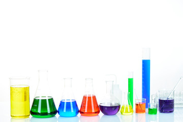 Laboratory glassware with colorful chemical reagent in research laboratory 