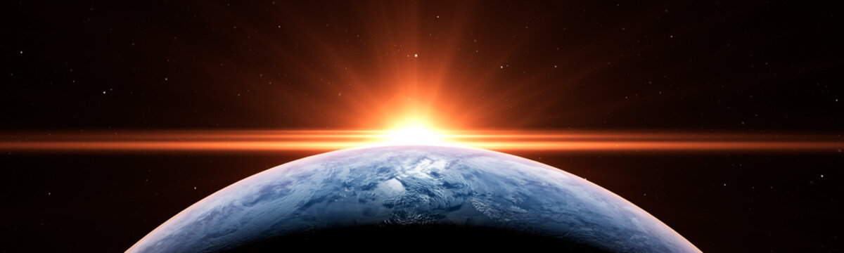 Sunrise over the planet Earth concept with a bright sun and flare and city lights panoramic