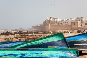 Fototapeta na wymiar Boats and city walls, Essaouira, Morocco