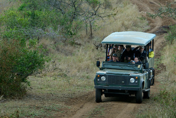 Obraz na płótnie Canvas Africa, South Africa, KwaZulu Natal, Hluhluwe, tourists on safari at Zulu Nyala Game Reserve. 