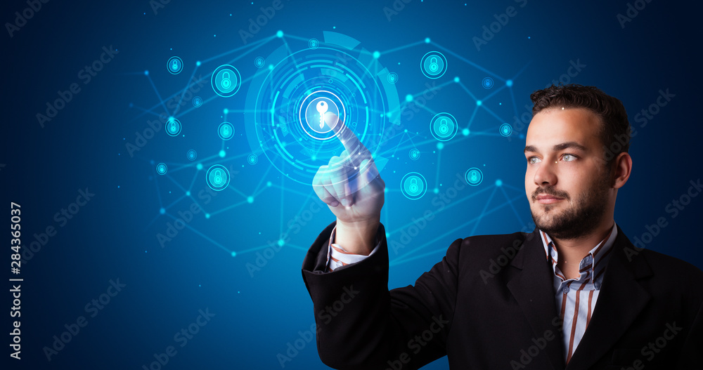 Poster Man touching hologram screen displaying keys and locks
