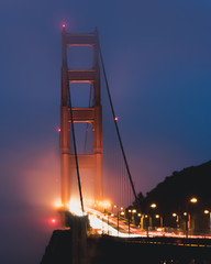 The Golden Gate Bridge on a foggy night