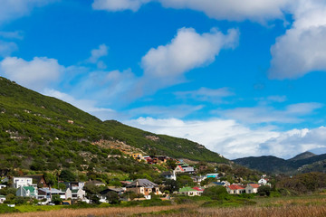 Fototapeta na wymiar Houses on mountain slope, Cape Town, South Africa