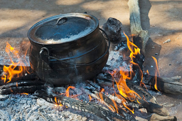 Pottery jar cooking on open fire, Mantenga Cultural Village, Swaziland
