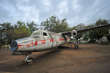 Fototapeta na wymiar Sao Tome, view of old plane in parque popular