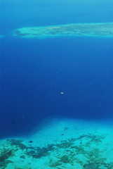 Tanzania, Zanzibar, Stone Town, turquoise aerial view on coral and small islets