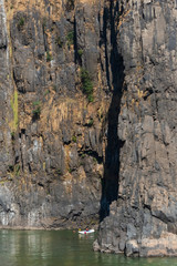 Tourists rafting at the bottom of Victoria Falls, Zimbabwe