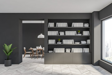 Gray living room with bookcase and dining table © ImageFlow