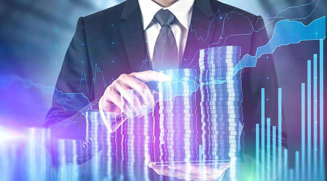 Man with tablet working with digital graph