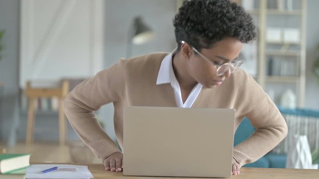 African Girl leaving laptop on Tabel After work Done