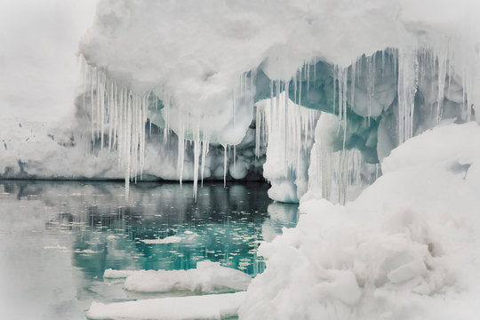 Lemaire Channel, Antarctica. Close-up of an iceberg with reflection.