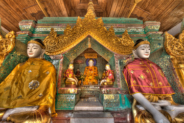 Myanmar, Yangon. Buddha statues in Shwedagon Temple. Credit as: Jim Zuckerman / Jaynes Gallery / DanitaDelimont.com