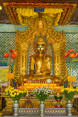 Myanmar. Mandalay. Sagaing Hill. Soon U Pon Nya Shin Paya. Buddha with a shiny gold face.